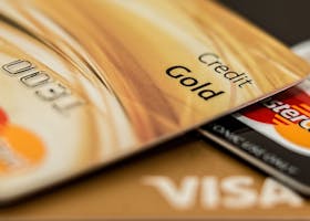 pexels photo 164501 164501 Stack of various branded credit cards focusing on gold card showing finance and cashless concept.